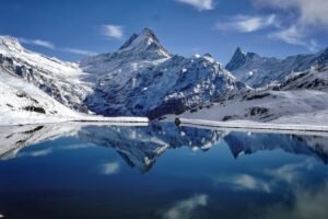 Lake Bachalpsee with snow-covered Alps